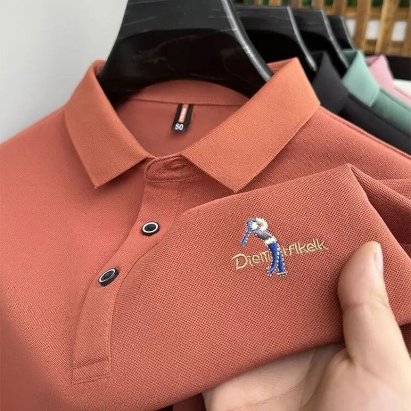 Close-up of an embroidered logo on a polo shirt