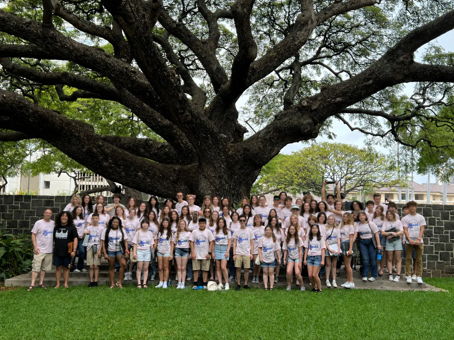 Students wearing custom school apparel by Aim High Marketing & Apparel