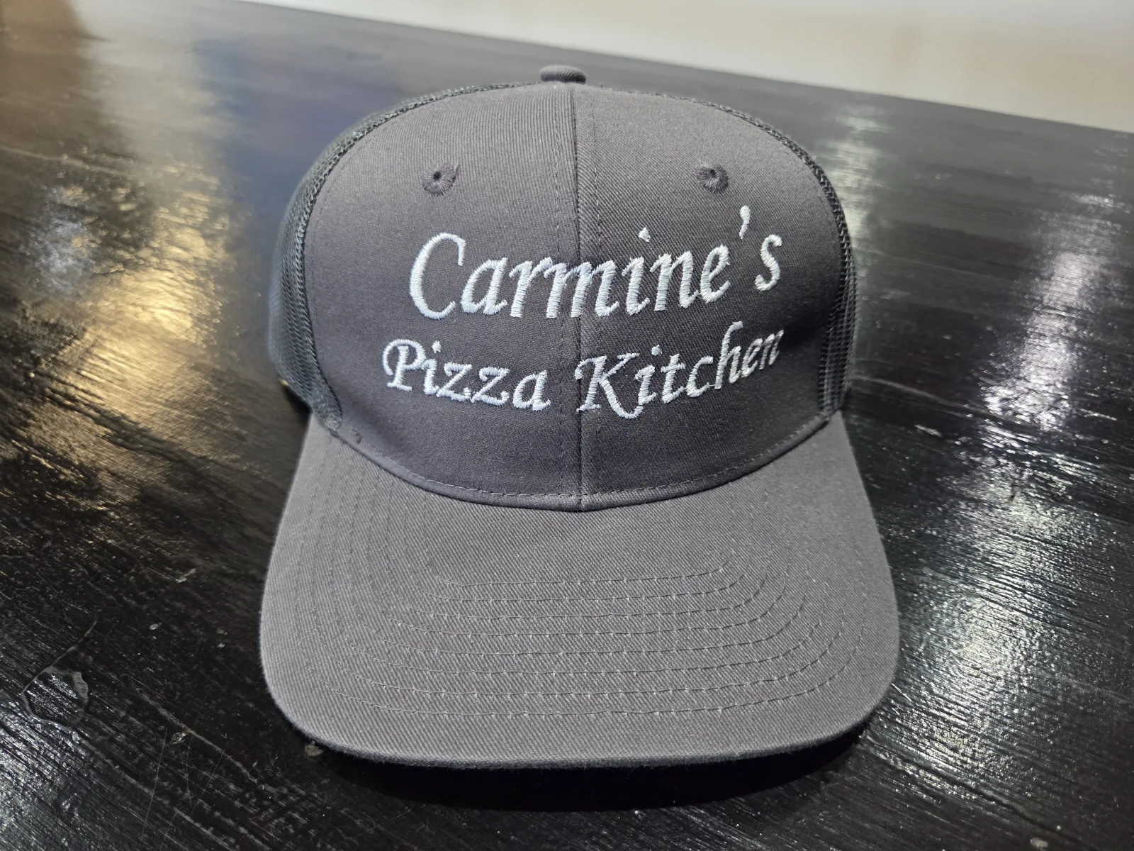 Custom embroidered cap for Carmine's Pizza Kitchen